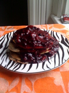 Stacked Pancakes with Blueberry Strawberry syrup
